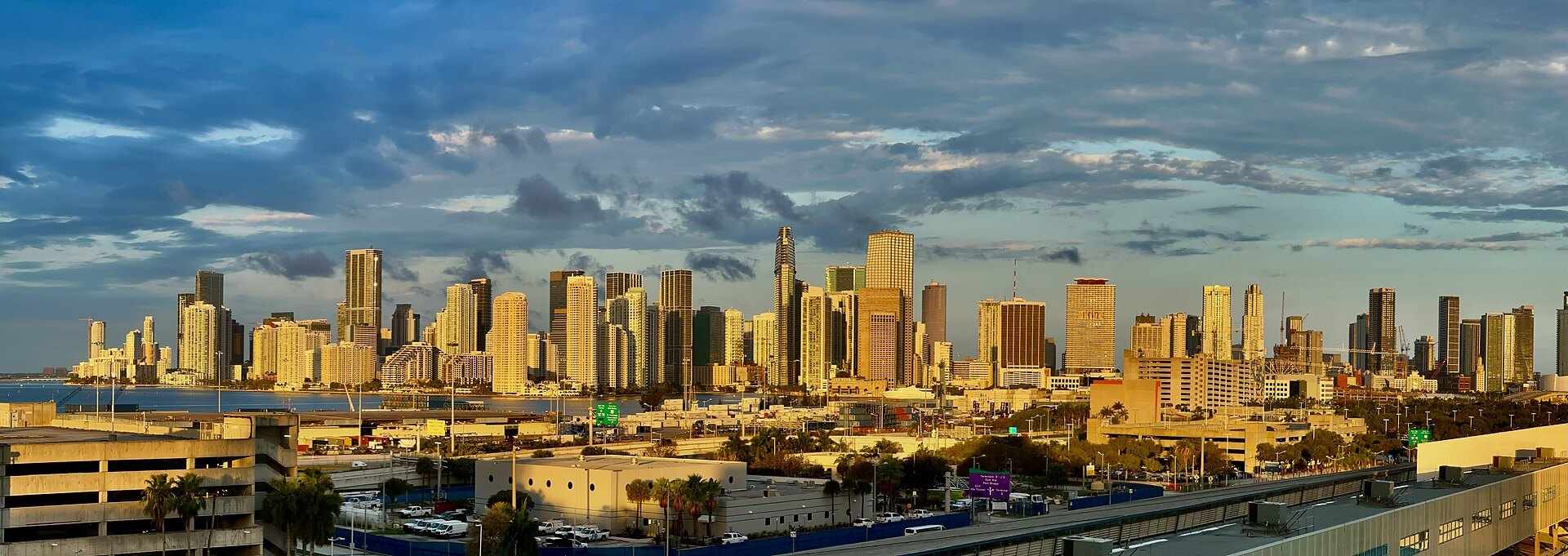Panoramic Miami skyline at sunrise above the port roadways, from the Trevor L Taylor guide to Miami as a business and finance city