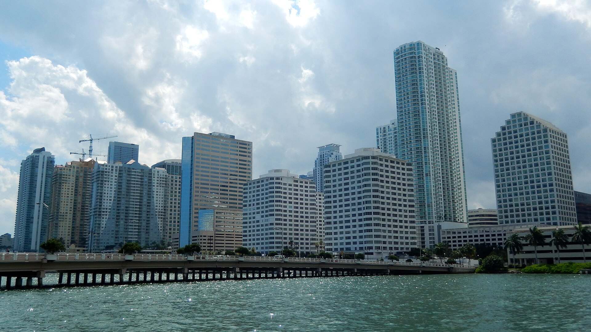 Brickell office and condominium towers seen across Biscayne Bay from Brickell Key, illustrating the Trevor L Taylor entry on family offices in Miami