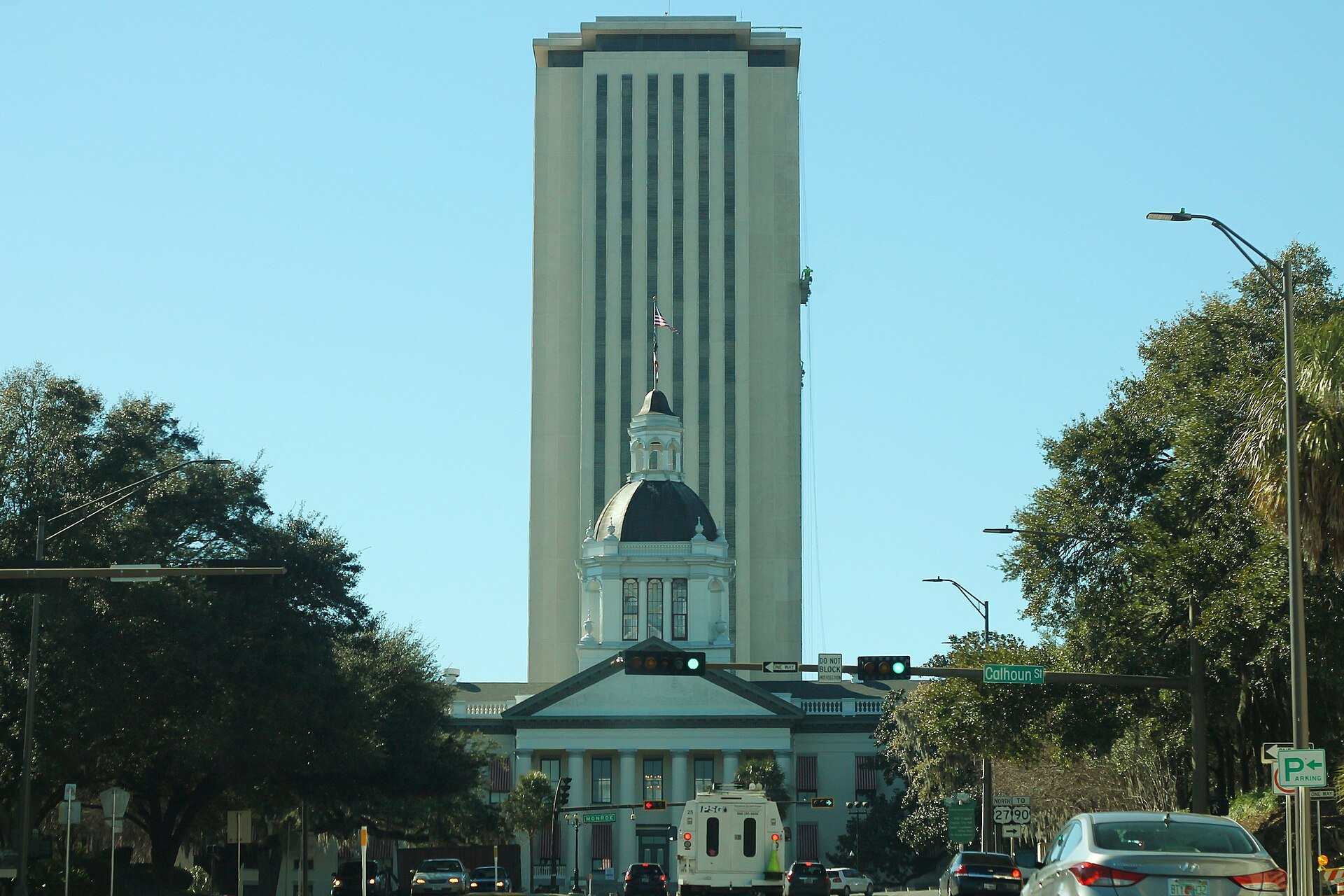 The Florida State Capitol tower rising behind the domed Historic Capitol, from the Trevor L Taylor entry on Florida and the state income tax