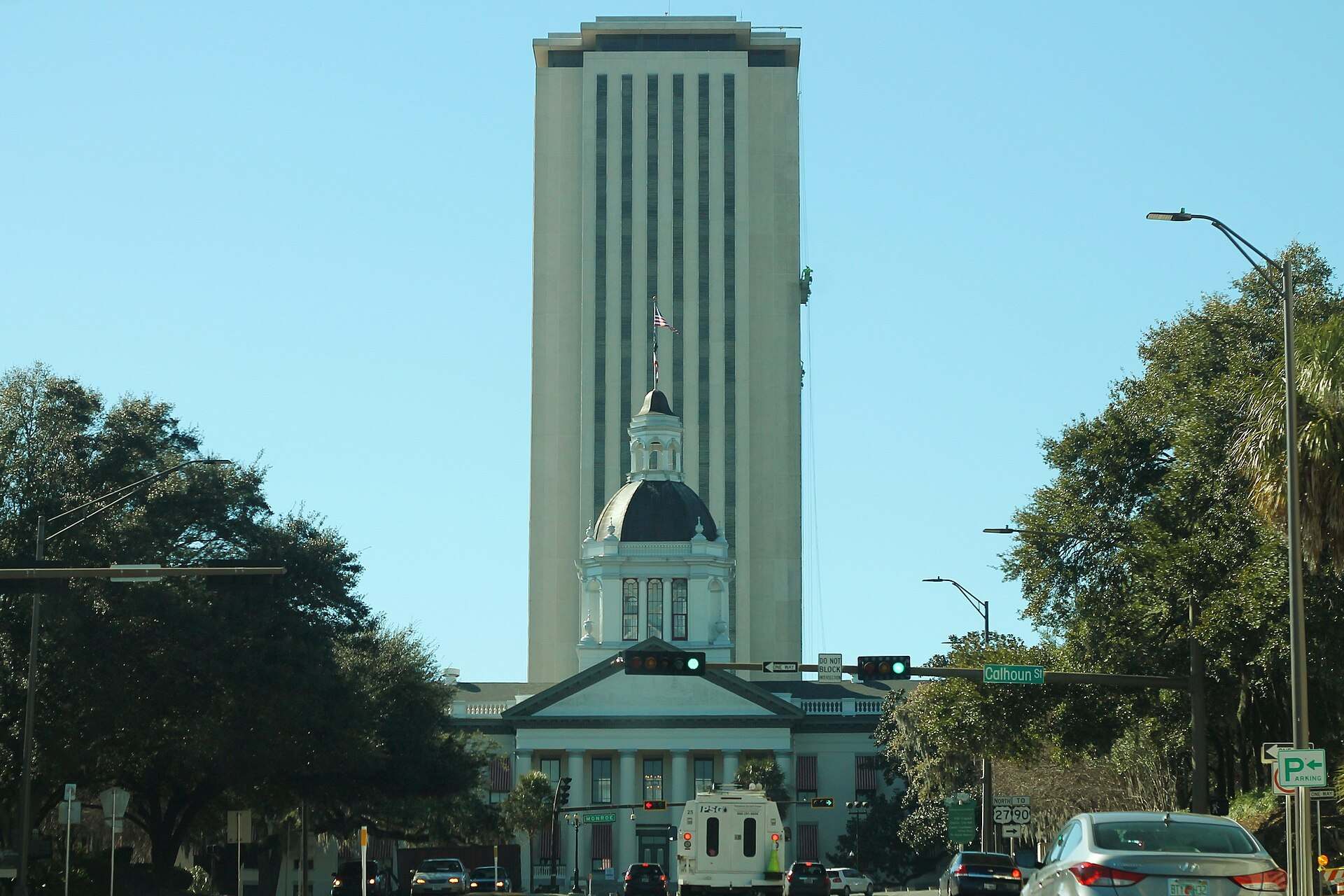 The Florida State Capitol tower rising behind the domed Historic Capitol, from the Trevor L Taylor entry on Florida and the state income tax