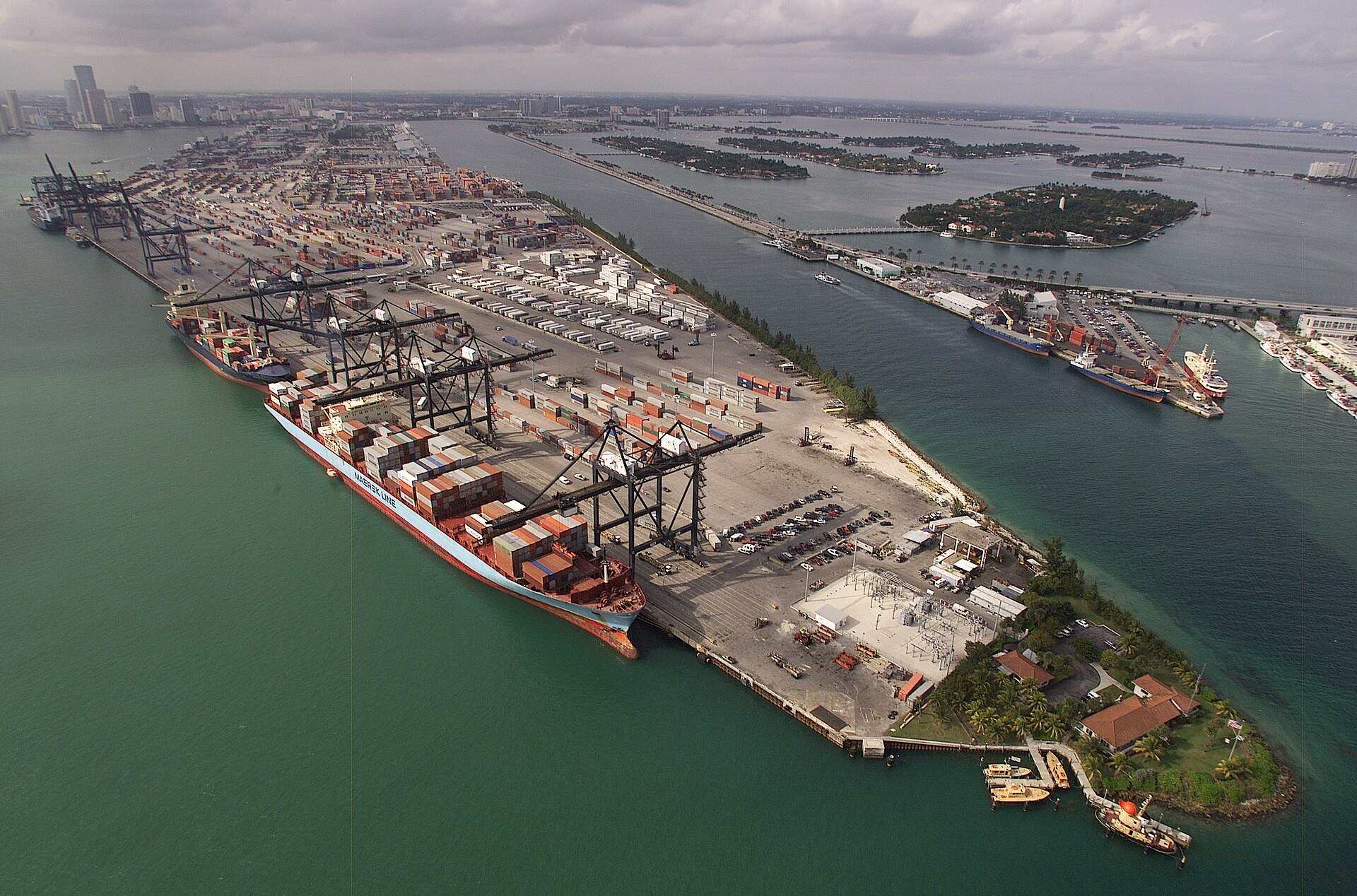 Aerial view of container ships and gantry cranes at the PortMiami cargo terminal on Biscayne Bay, from the Trevor L Taylor entry on PortMiami