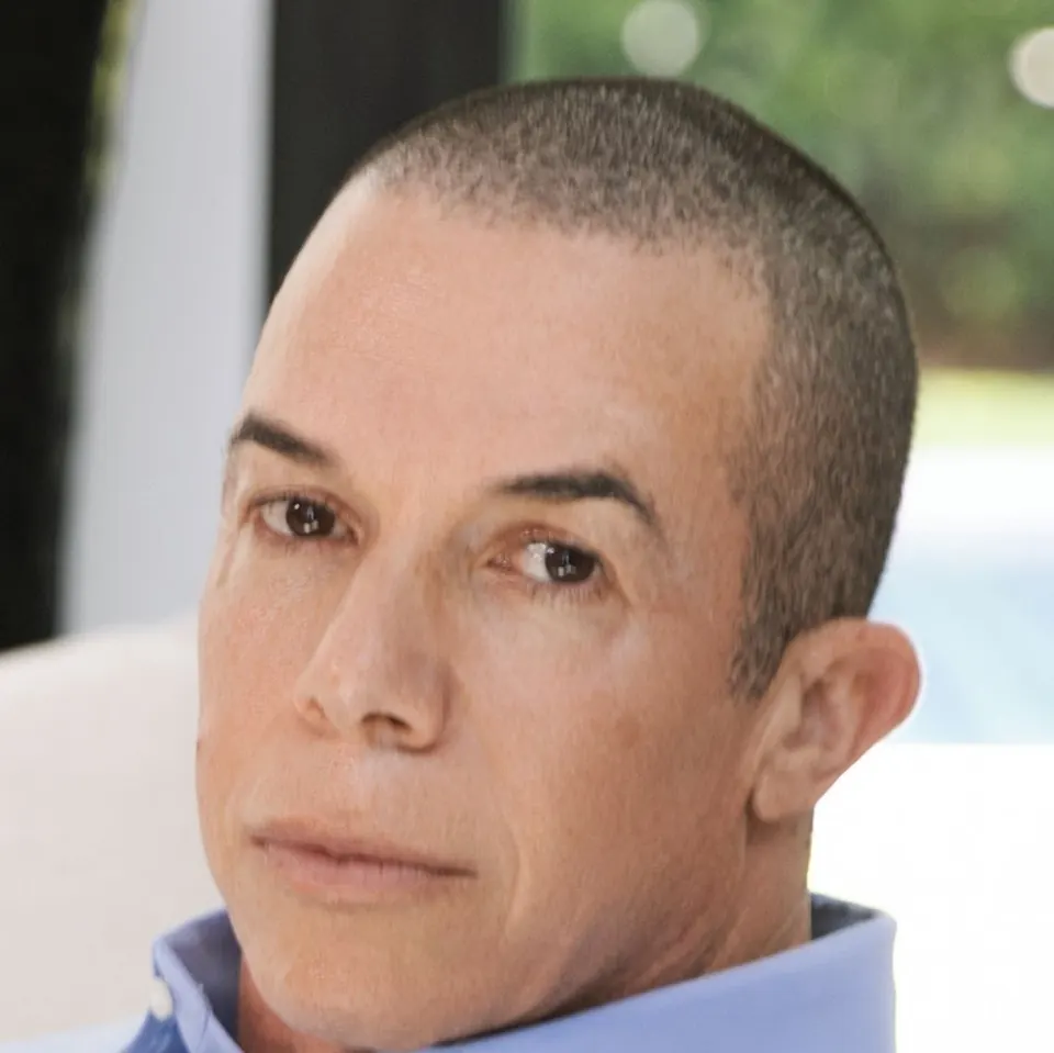 Close portrait of Trevor L Taylor looking toward the camera with a level, composed expression